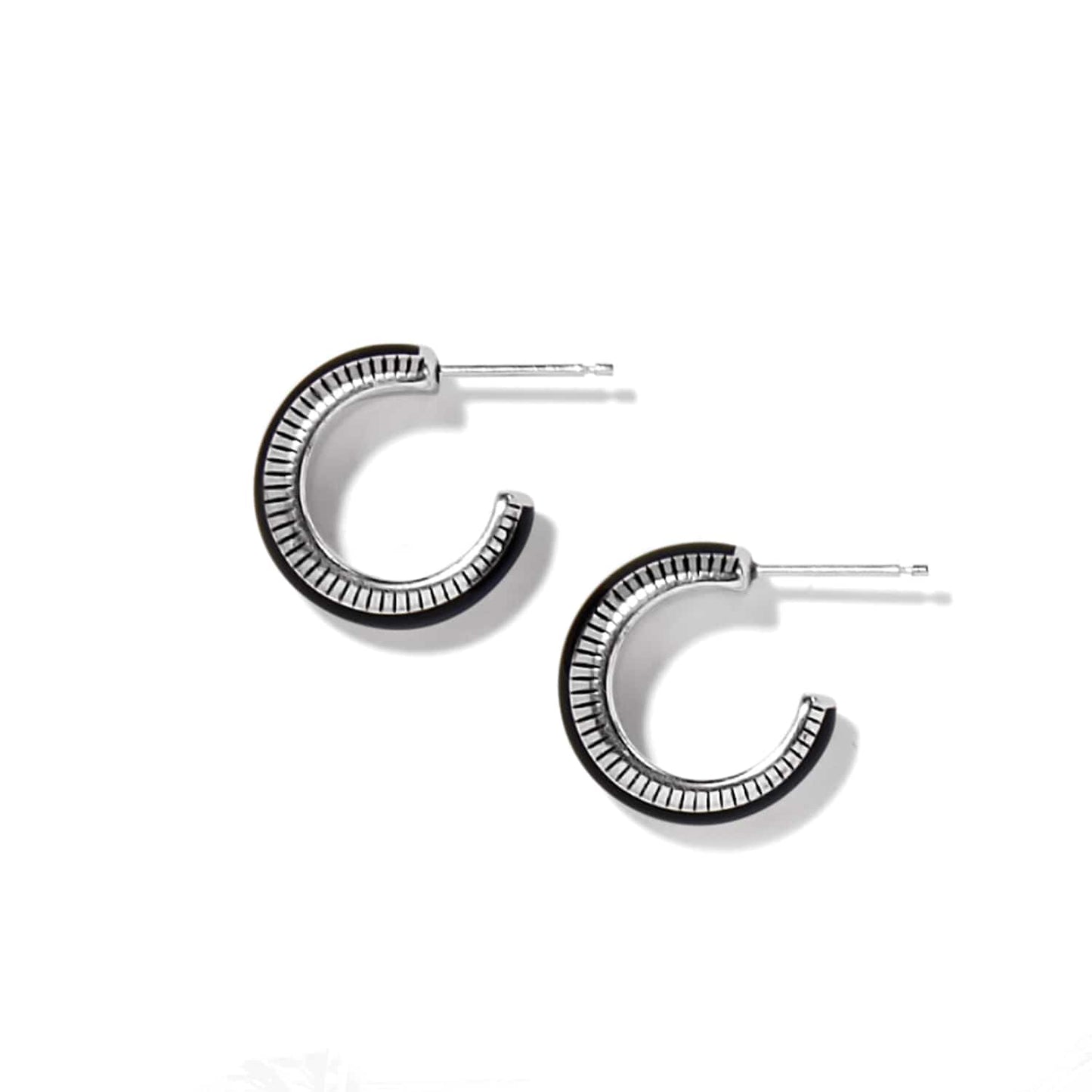 Brighton hoop earrings with silver-plated finish and black enamel edge detail on a white background