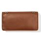Brighton handbag shown from the back in brown pebbled leather with silver-tone strap rings on a white background