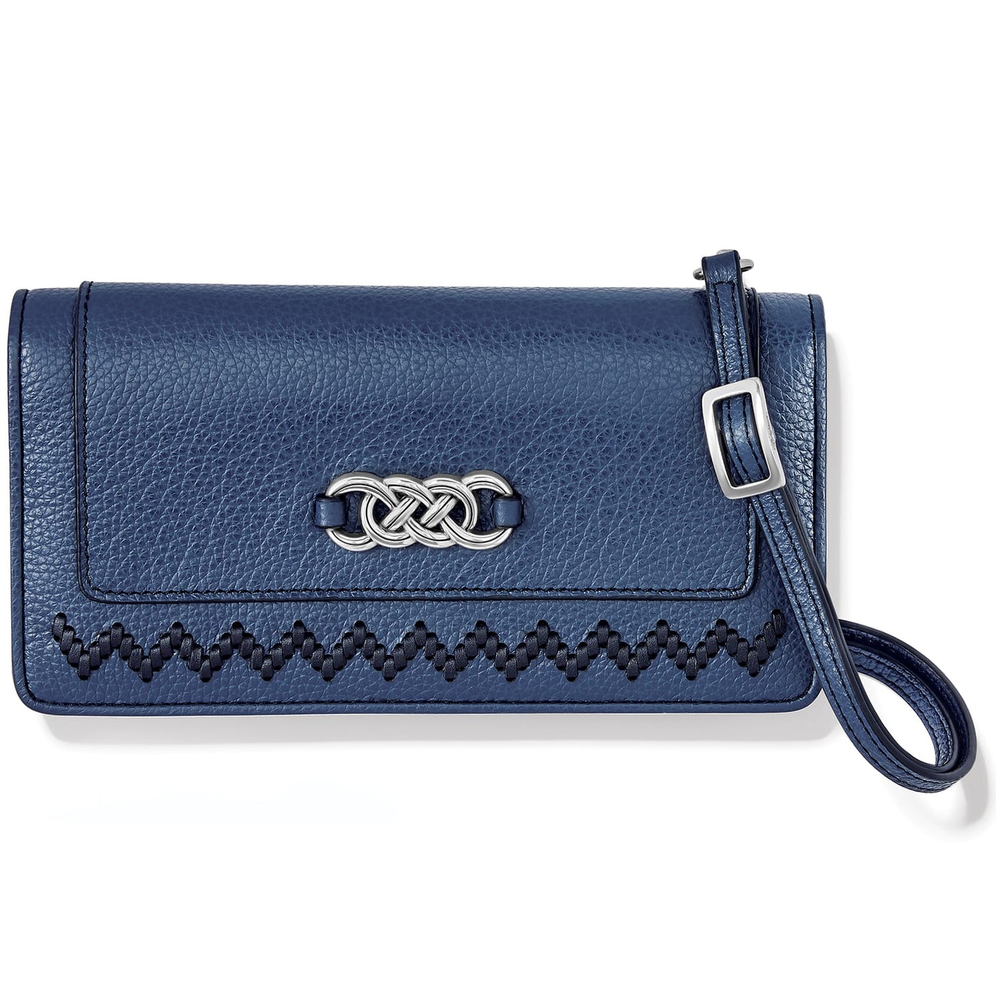 Brighton navy leather wristlet wallet with silver-tone interlocking knot emblem and zigzag stitching on a white background