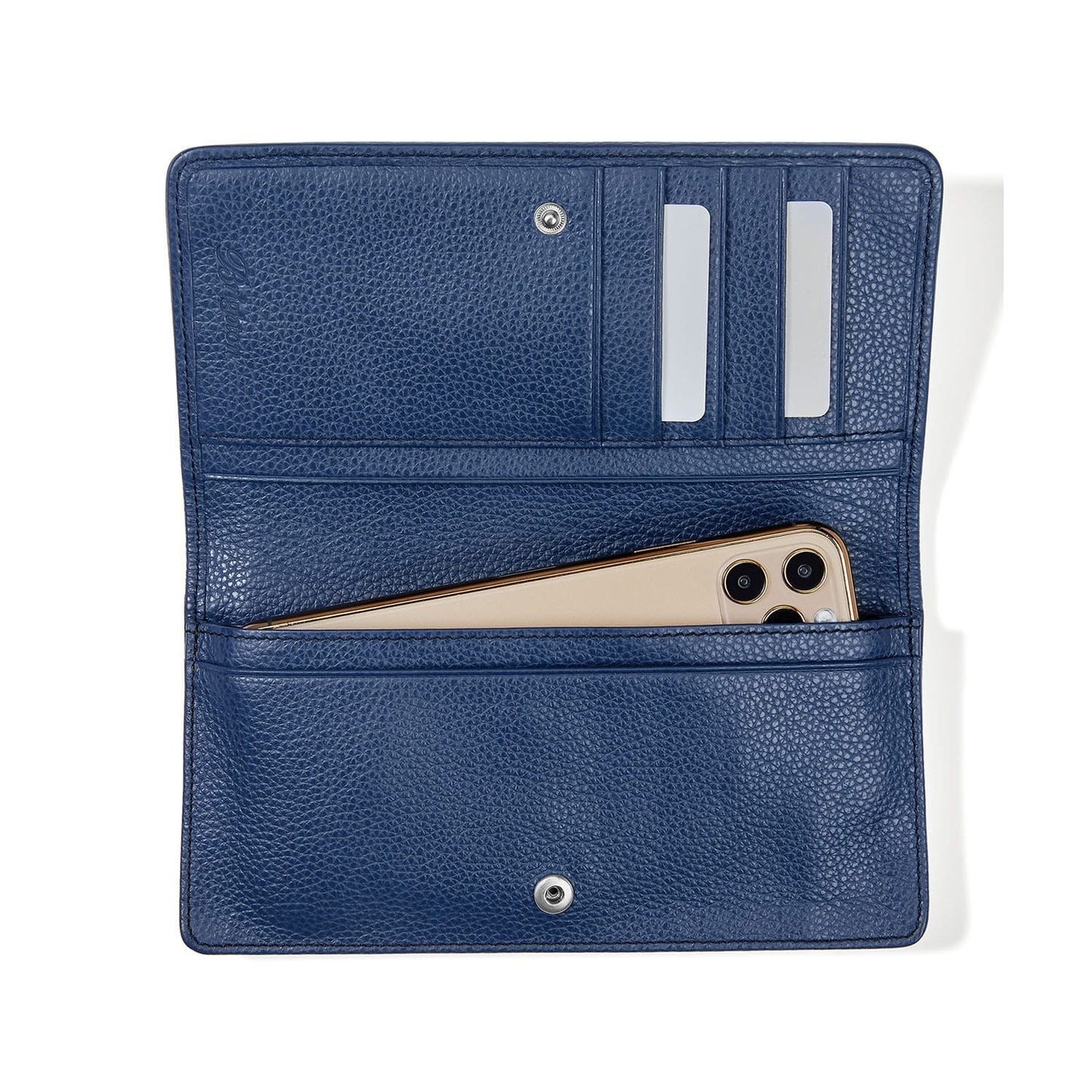 Brighton wallet shown open with navy pebbled leather interior, card slots, and phone pocket on a white background