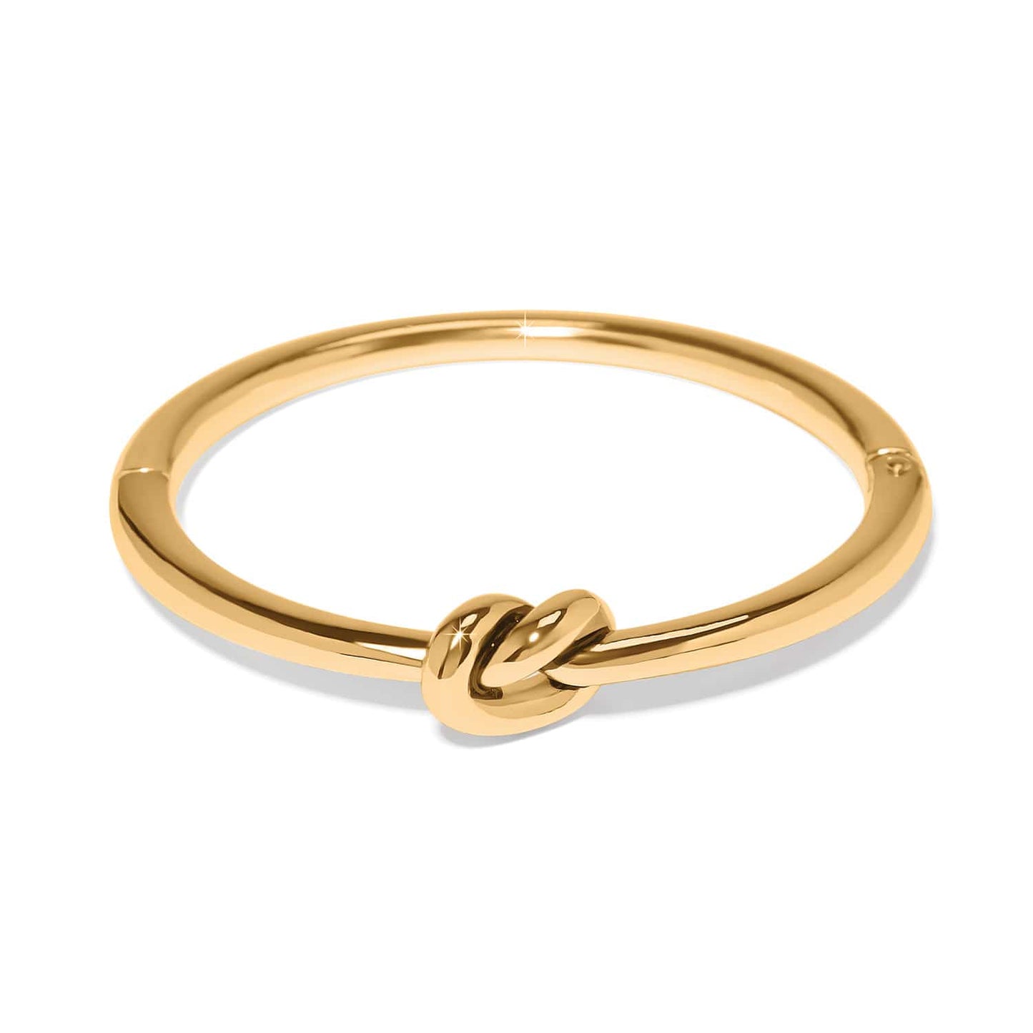 Brighton gold-plated bangle bracelet with polished knot accent at the front on a white background