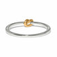 Brighton ring with silver-tone band and gold-tone knot accent at the center on a white background