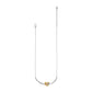 Brighton necklace with silver-tone chain and curved bar featuring a gold-tone knot accent on a white background
