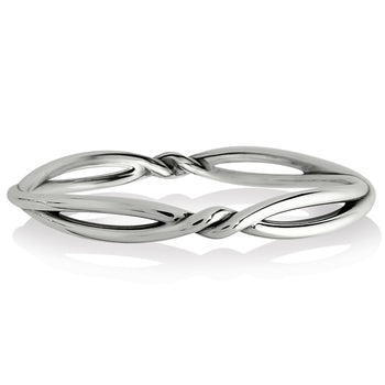 Brighton bangle bracelet with silver-plated intertwined open twist design and polished finish on a white background