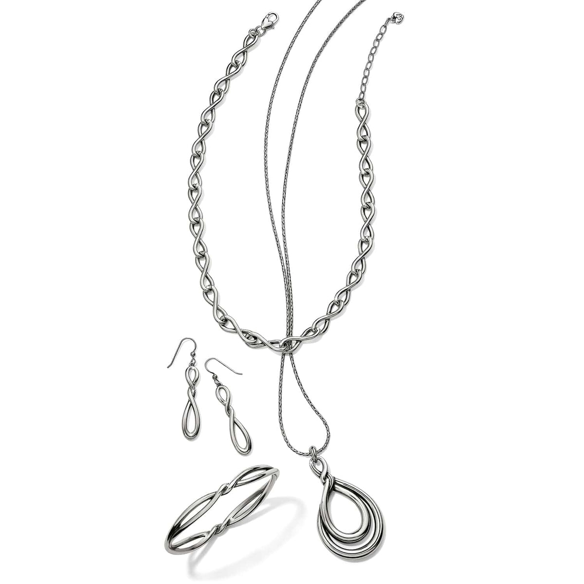 Brighton silver-plated jewelry set styled with infinity link necklace, teardrop pendant, drop earrings, and bangle bracelet