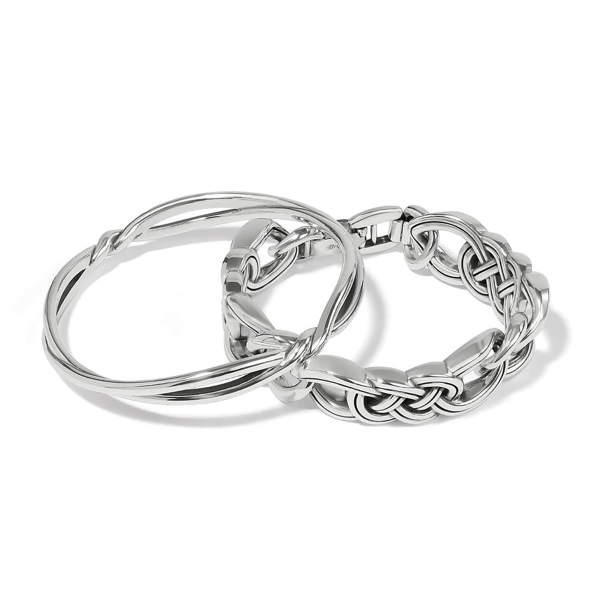 Brighton set of three silver-plated bracelets with twisted, woven, and braided link designs on a white background