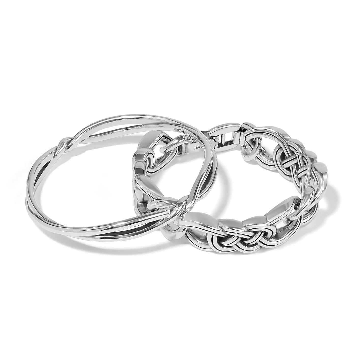 Brighton set of three silver-plated bracelets with twisted, woven, and braided link designs on a white background