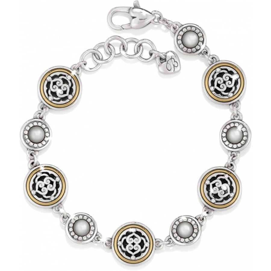 Brighton bracelet with silver-plated and gold-plated medallions featuring scrollwork and pearl-like cabochon accents on a white background