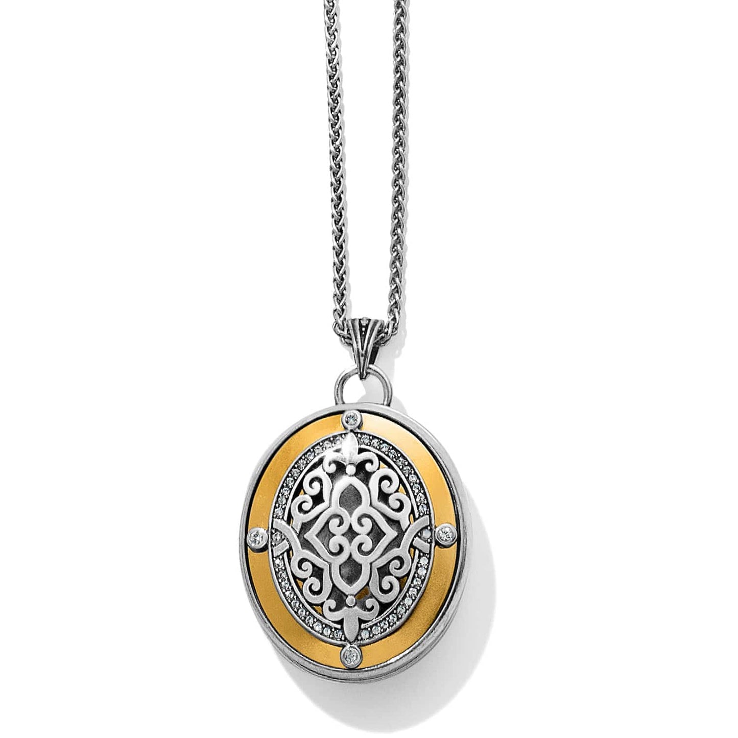 Brighton pendant necklace with two-tone oval medallion, scrollwork center, and crystal accents on a white background