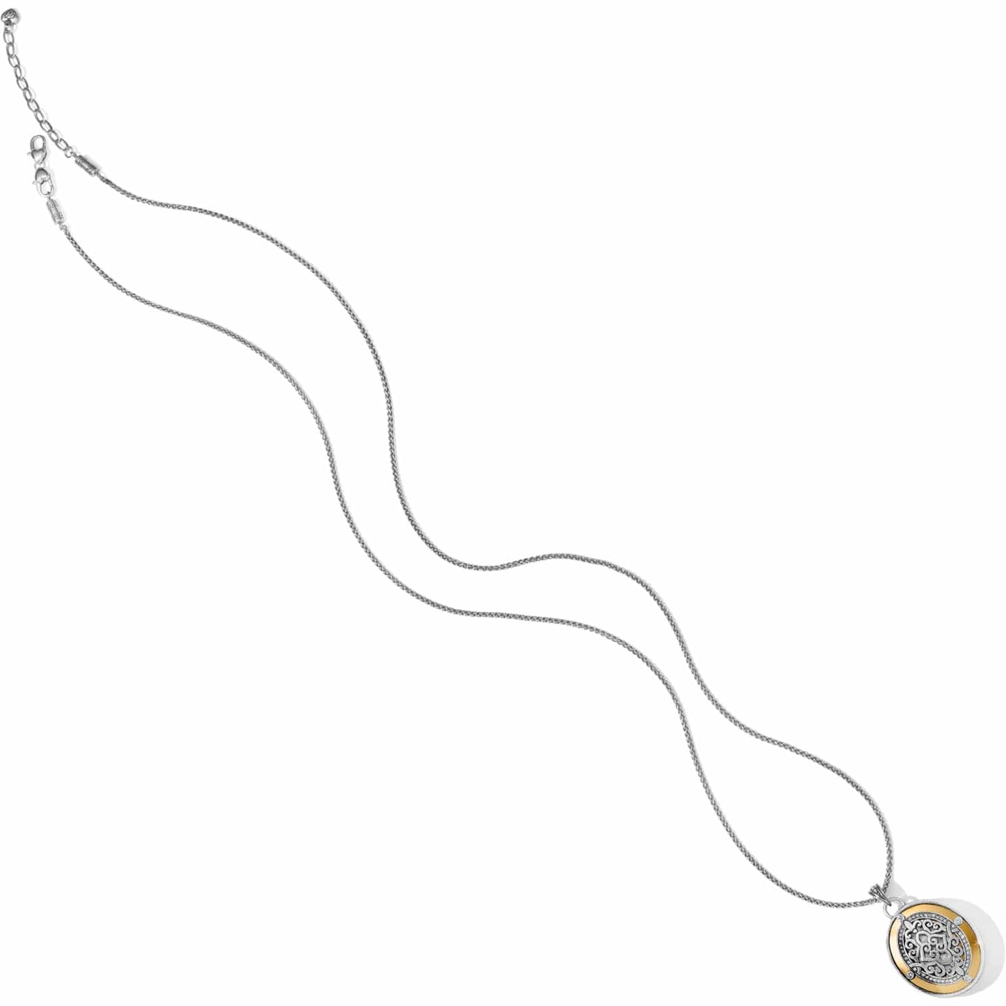 Brighton pendant necklace with two-tone medallion featuring silver scrollwork, gold border, and crystal accents on white background