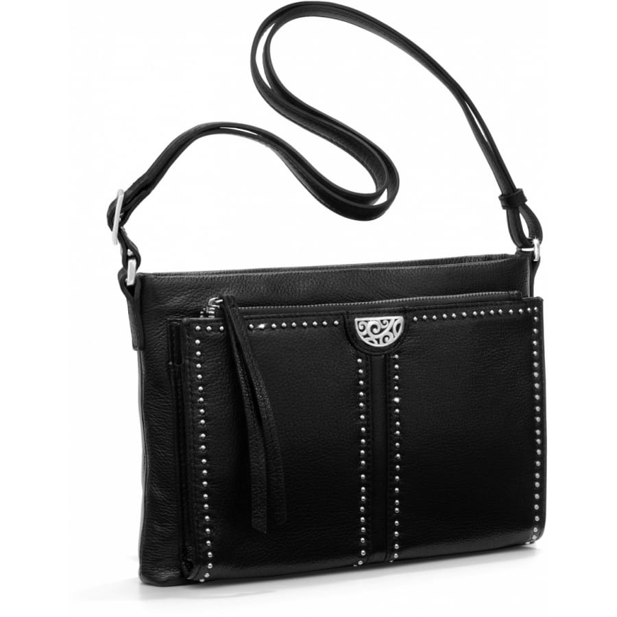 Brighton crossbody handbag in black leather with studded trim, silver-tone medallion, and adjustable strap on a white background