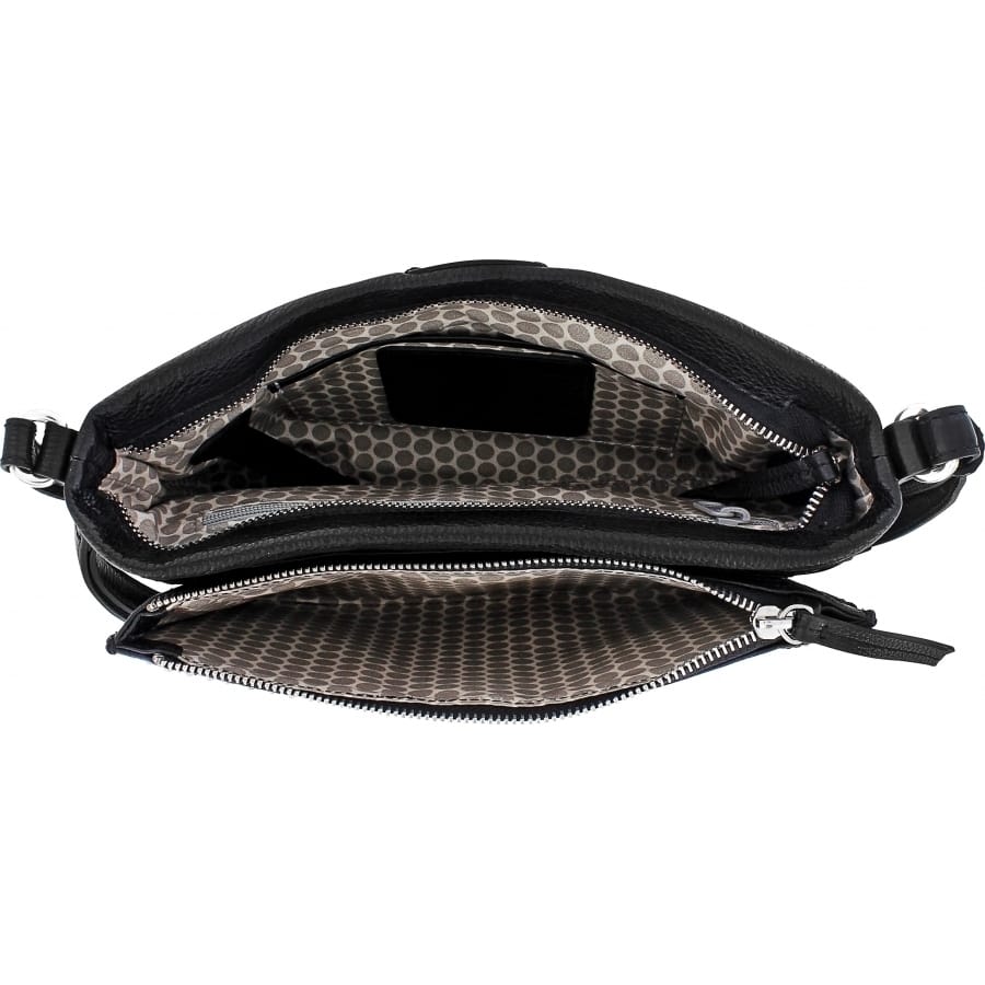 Brighton black handbag shown open with patterned gray interior lining and zippered compartments on a white background
