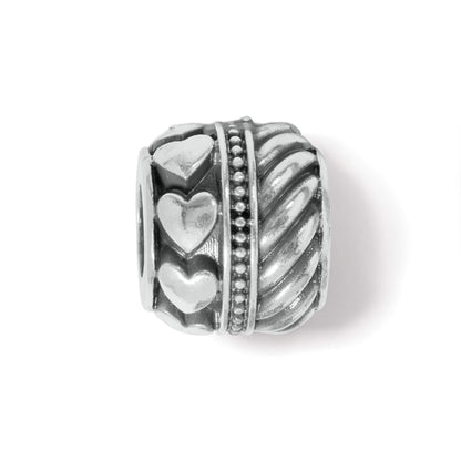 Brighton silver-plated bead charm with raised heart motifs, beaded band, and twisted rope pattern on a white background