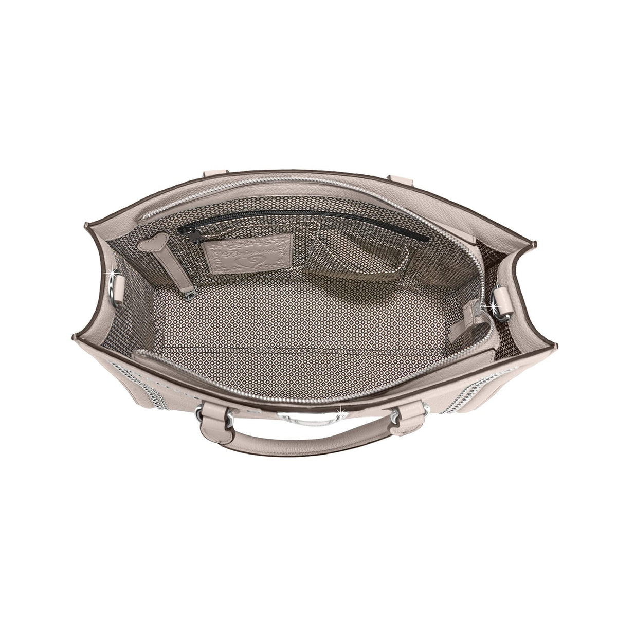 Brighton handbag interior view showing patterned fabric lining, zippered pocket, and logo tag on a white background