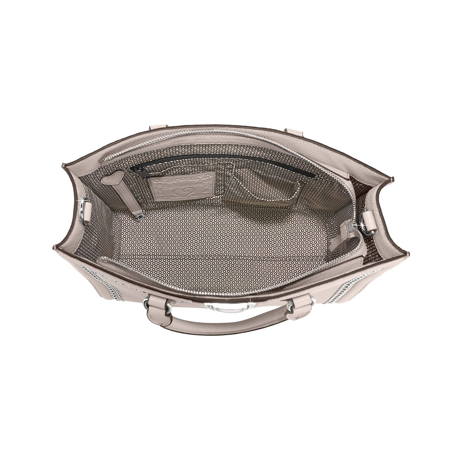 Brighton handbag interior view showing patterned fabric lining, zippered pocket, and logo tag on a white background