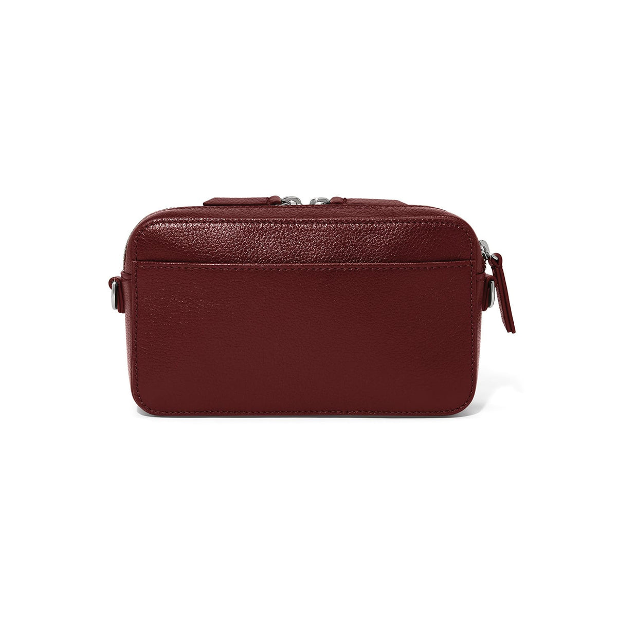Brighton burgundy leather crossbody handbag shown from the back with slip pocket and silver-tone zippers on a white background