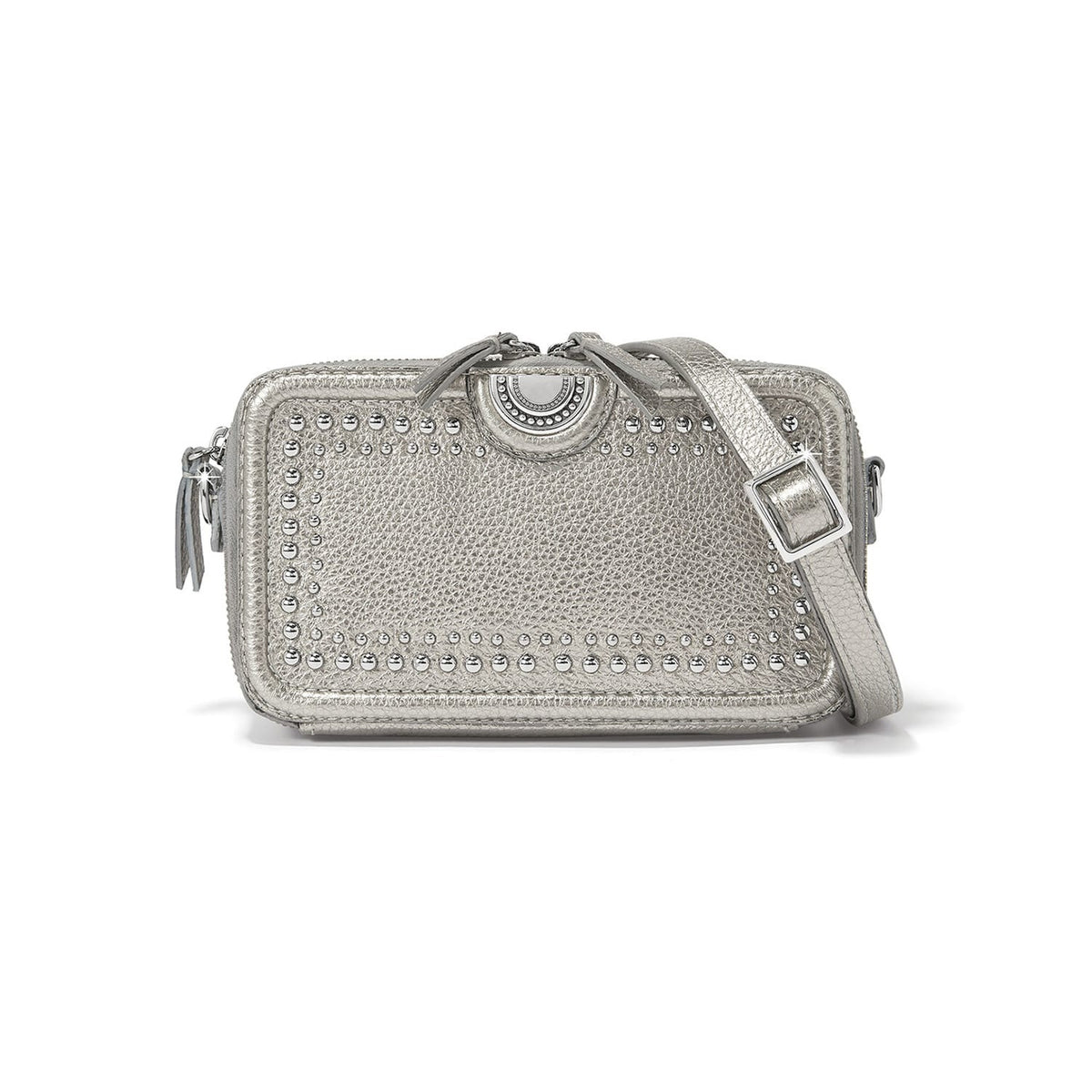 Brighton silver metallic crossbody handbag with studded trim, medallion accent, and adjustable strap on a white background