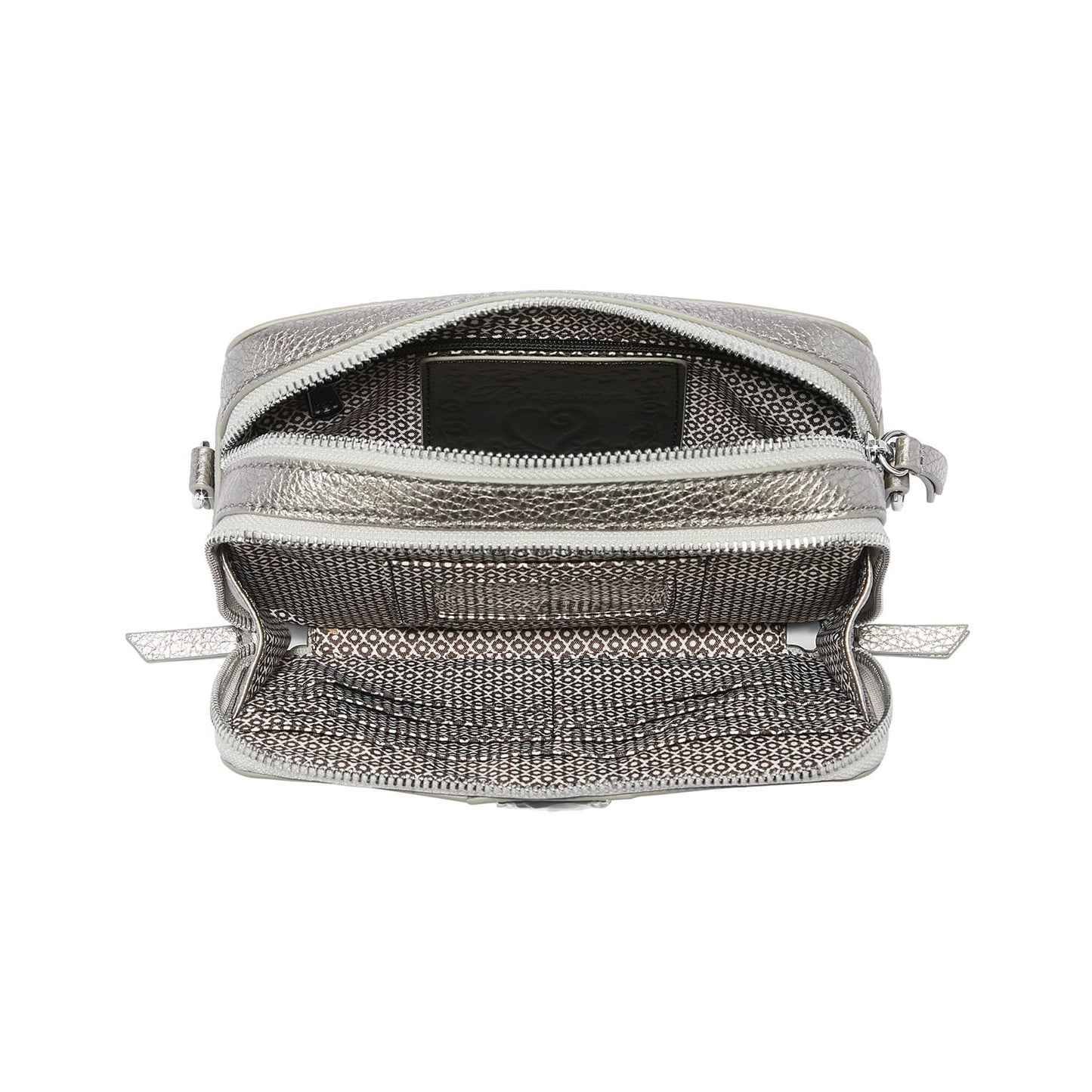 Brighton metallic silver handbag shown open with patterned interior lining and zippered compartments on a white background