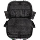Close-up of Brighton luggage interior view with black heart-print lining, elastic mesh pocket, and zippered compartments