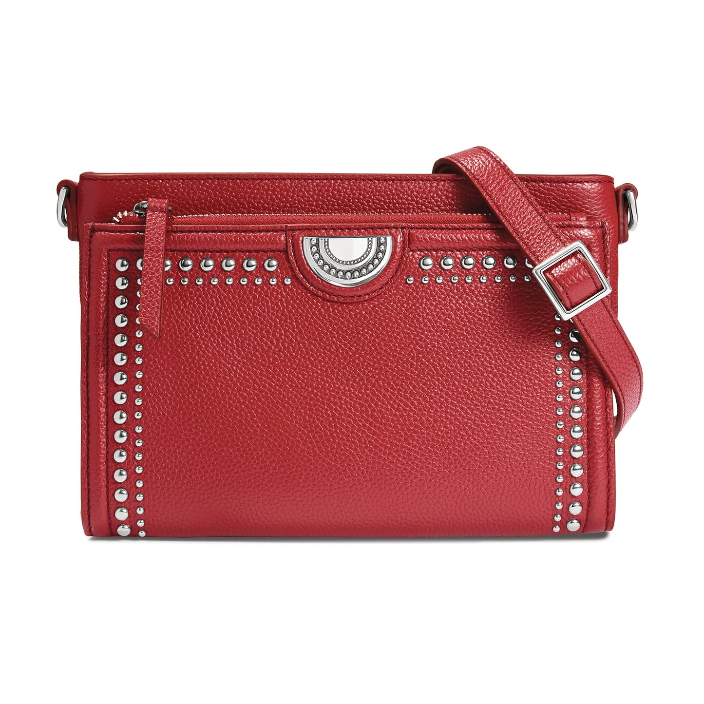 Brighton red leather crossbody handbag with silver-tone studded trim, medallion accent, and adjustable strap on a white background