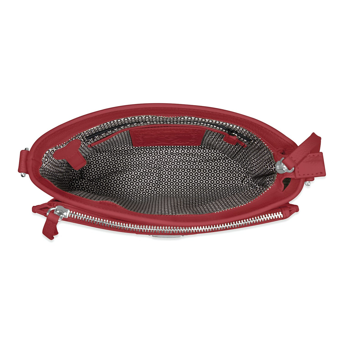 Brighton red leather handbag shown open with patterned black and white interior lining and silver-tone zipper on a white background