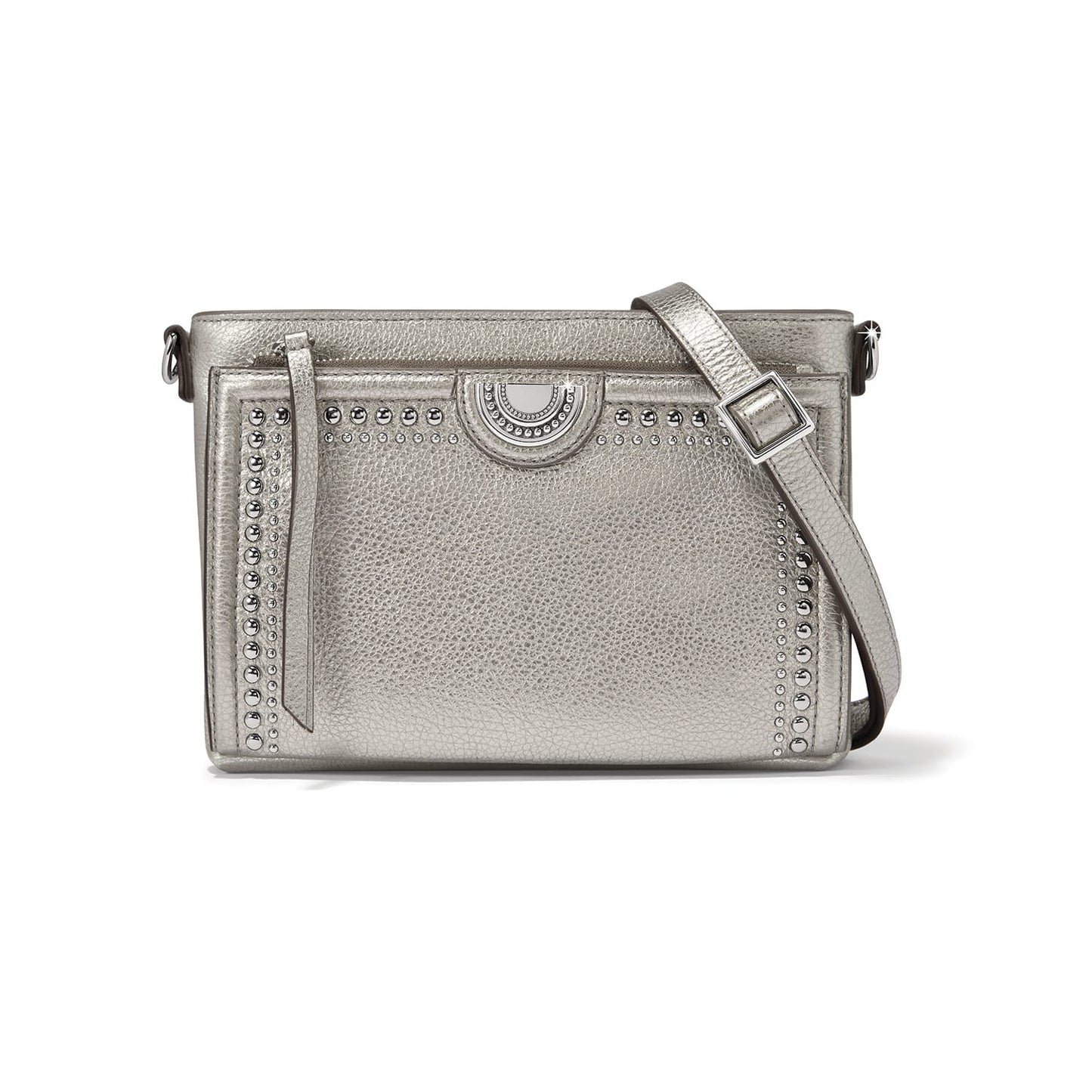 Brighton crossbody handbag in metallic silver with stud trim, medallion accent, and adjustable strap on a white background
