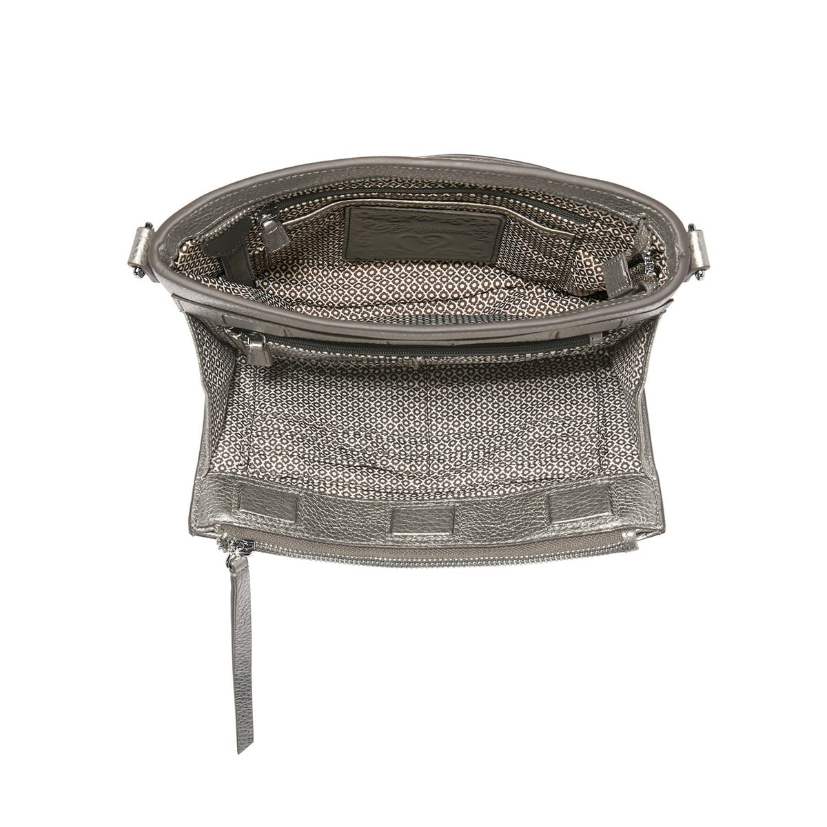 Brighton metallic pewter handbag interior view with patterned fabric lining and zippered pocket on a white background