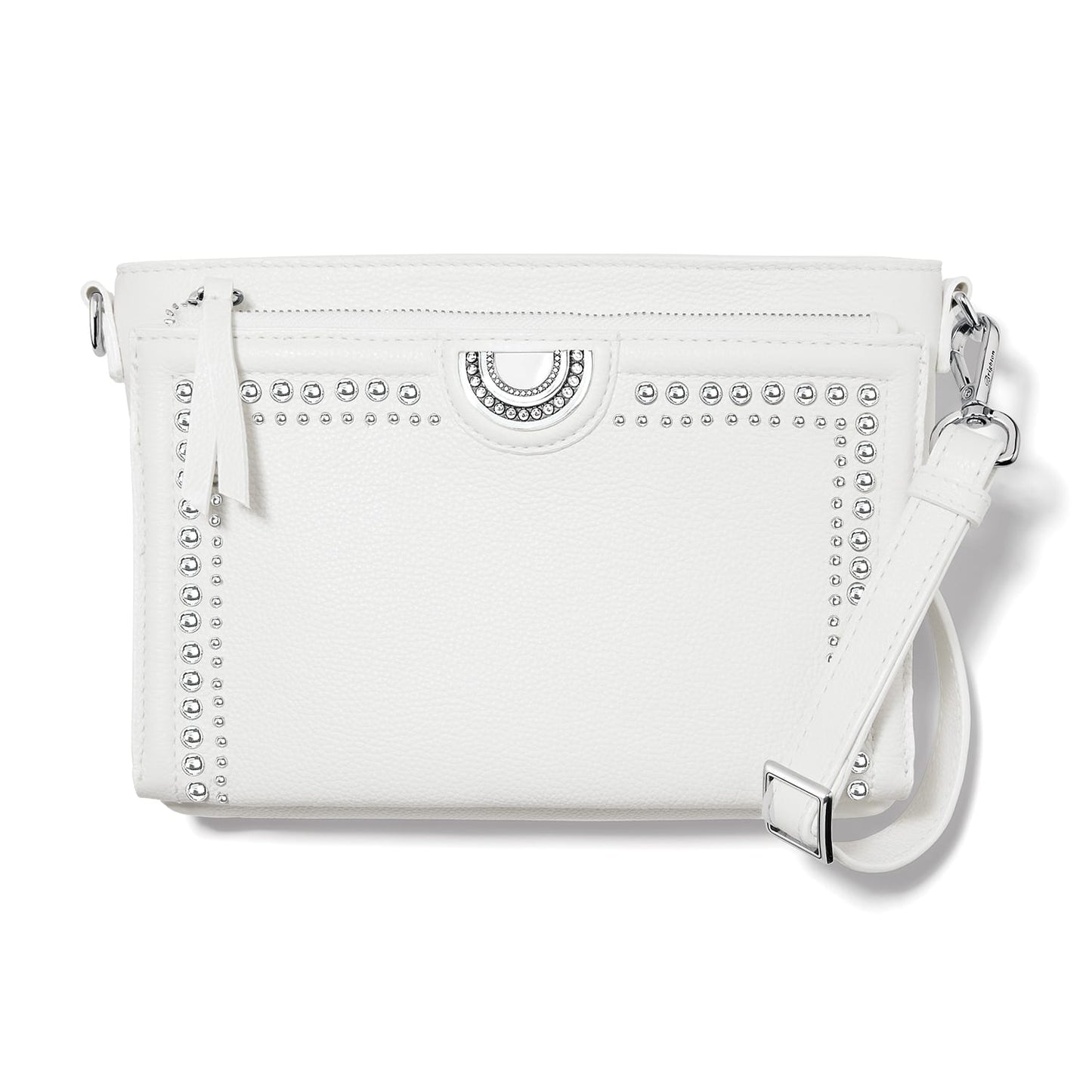 Brighton white leather crossbody handbag with silver-tone studded trim, crystal medallion accent, and adjustable strap on a white background