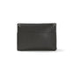 Brighton black pebbled leather handbag shown from the back with silver-tone studs and front slip pocket on a white background