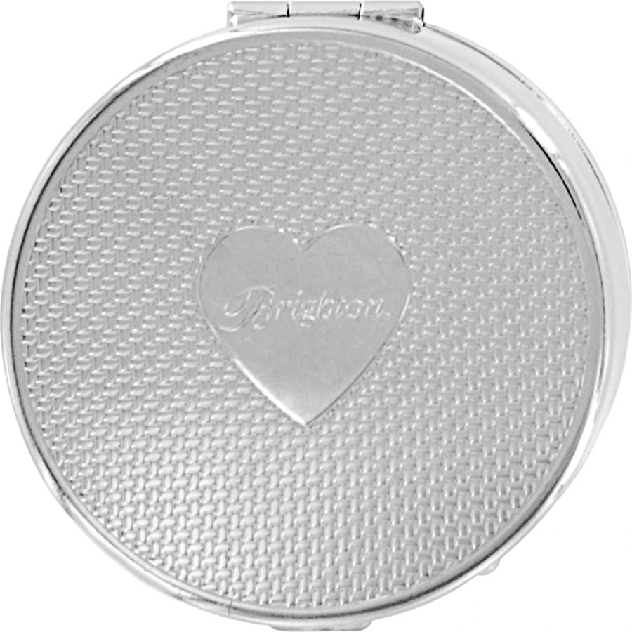 Brighton compact mirror with silver-tone woven texture and engraved heart emblem with logo on a white background