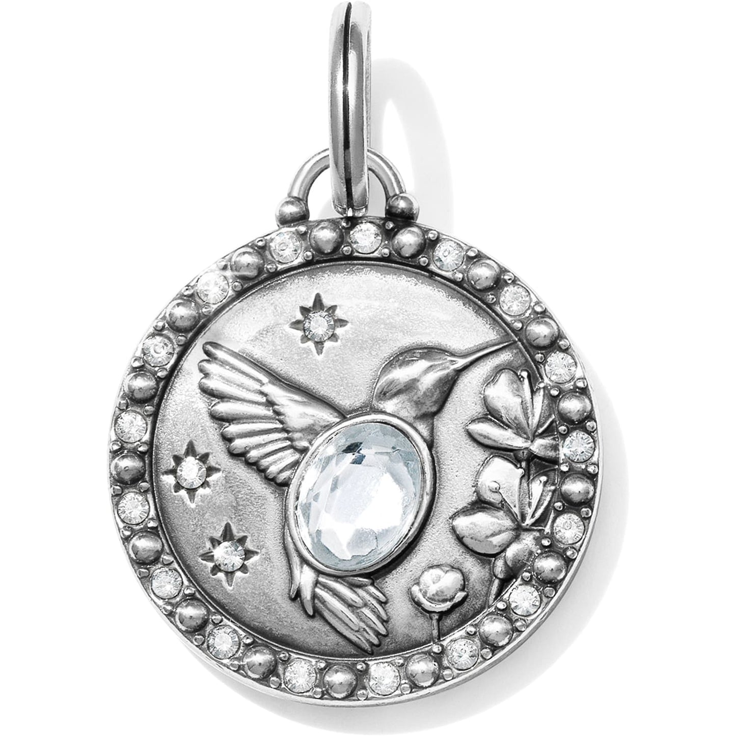 Brighton silver-plated charm pendant with hummingbird, flowers, stars, central crystal, and pave crystal border on a white background