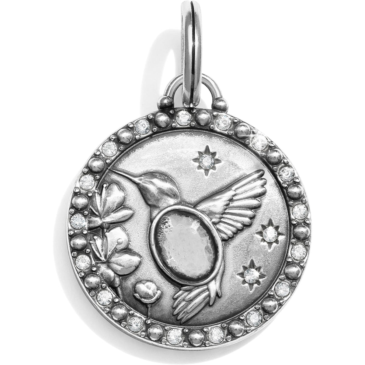 Brighton silver-plated charm pendant with hummingbird, flowers, stars, and crystal-accented border on a white background