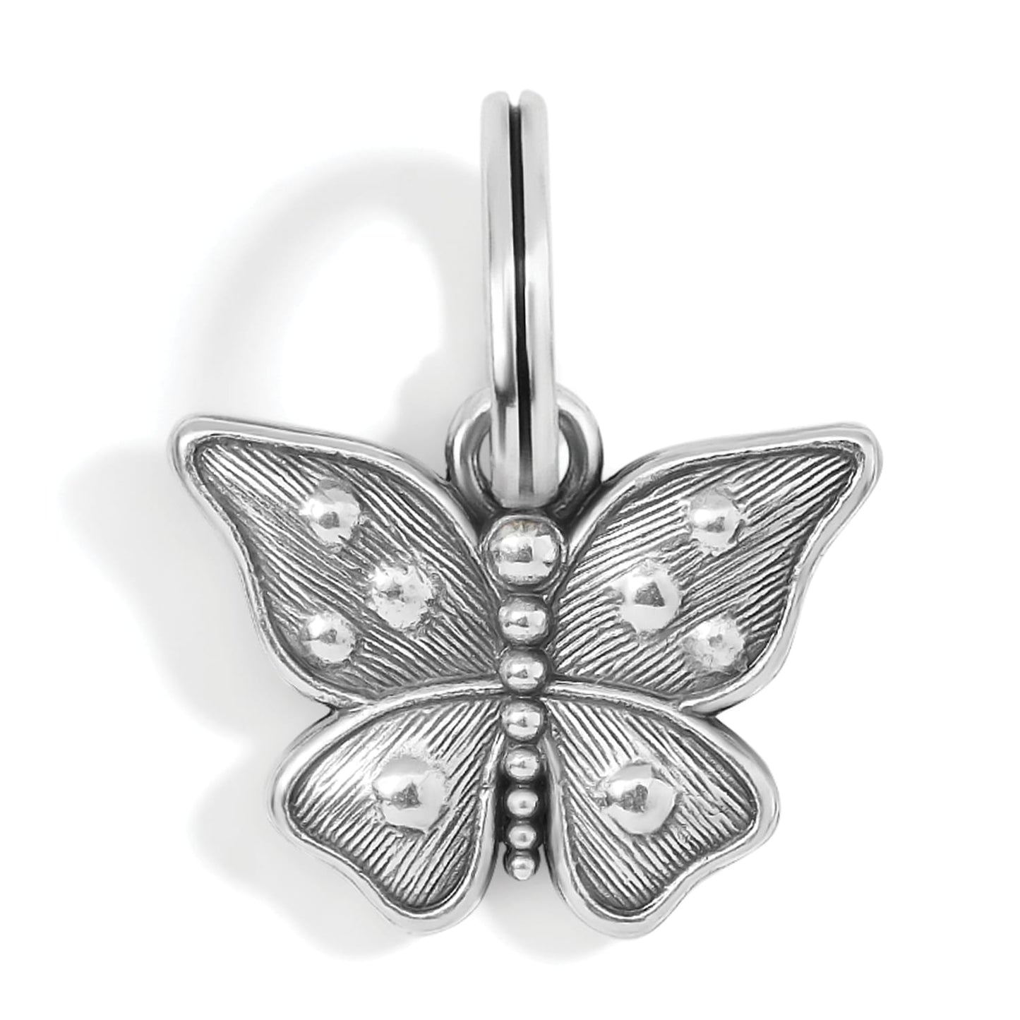 Brighton butterfly charm with silver-plated finish, textured wings, and beaded body detailing on a white background