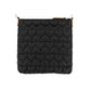 Brighton crossbody handbag shown from the back with black quilted heart pattern and leather trim on a white background