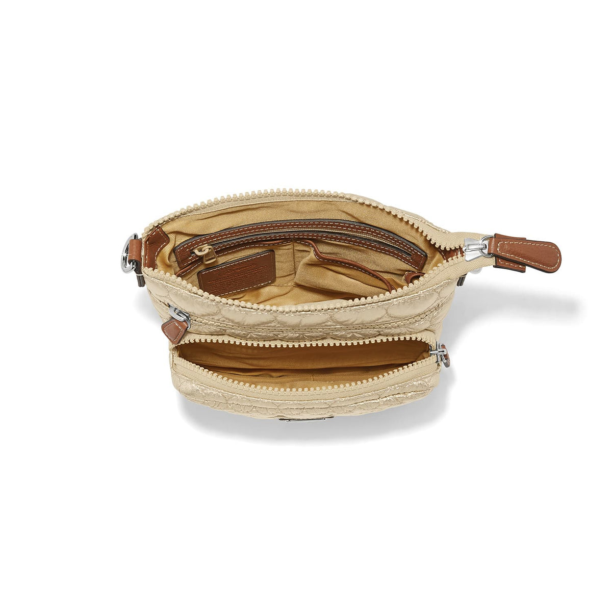 Brighton handbag interior view showing tan fabric lining, zippered pockets, and leather trim details on a white background