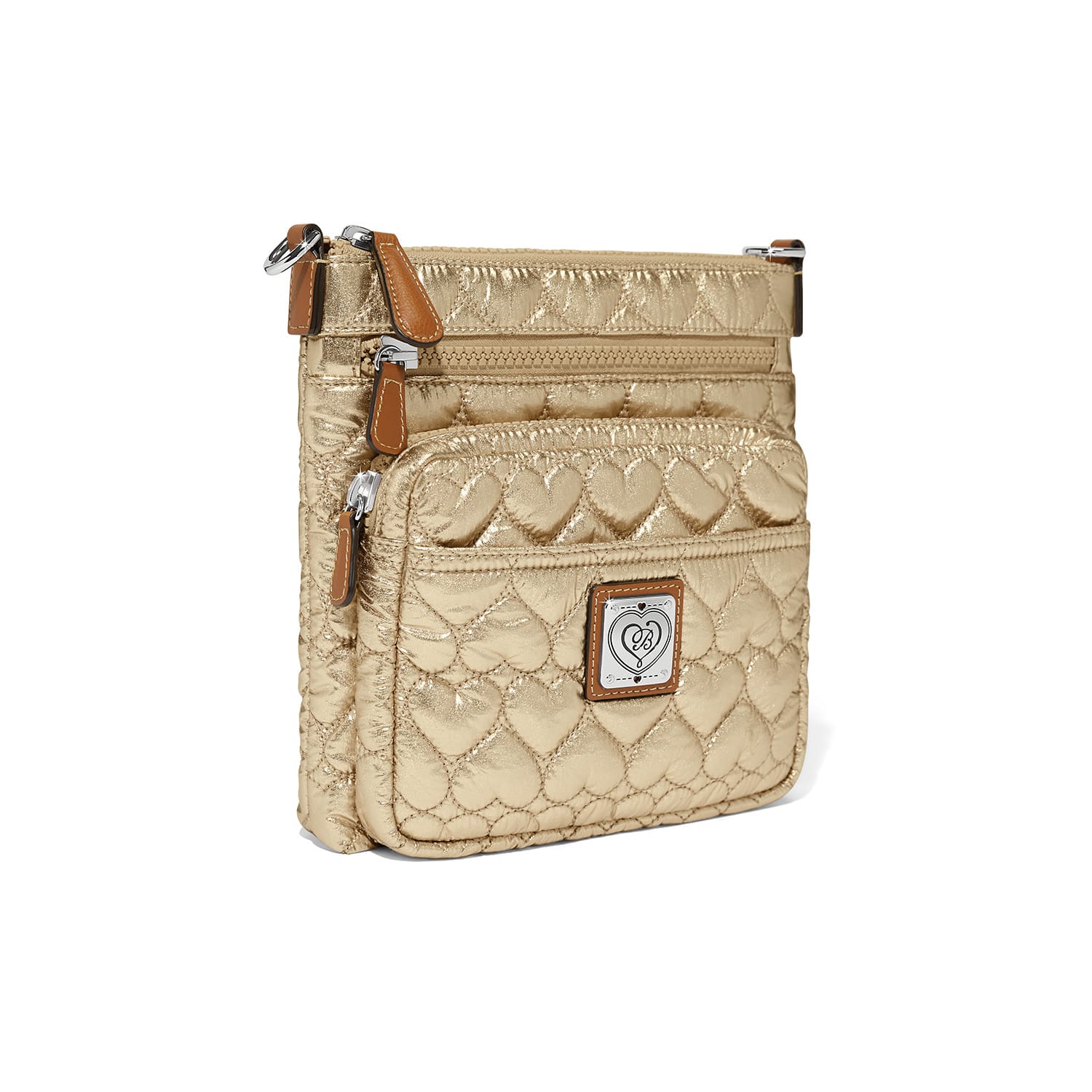 Brighton crossbody handbag in gold heart-quilted metallic fabric with leather zipper pulls and heart logo plaque on a white background