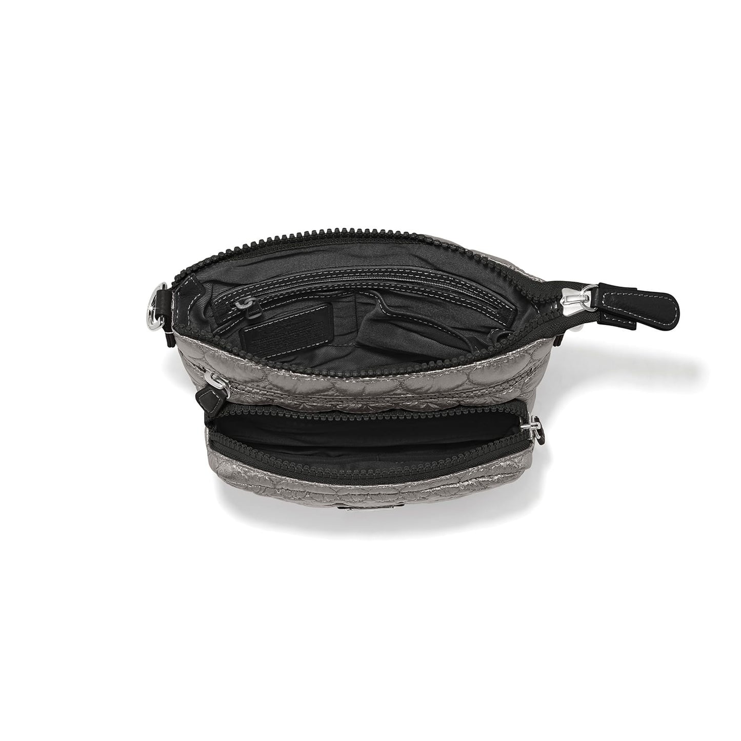 Brighton metallic silver quilted handbag shown open with black interior lining and multiple zip compartments on a white background