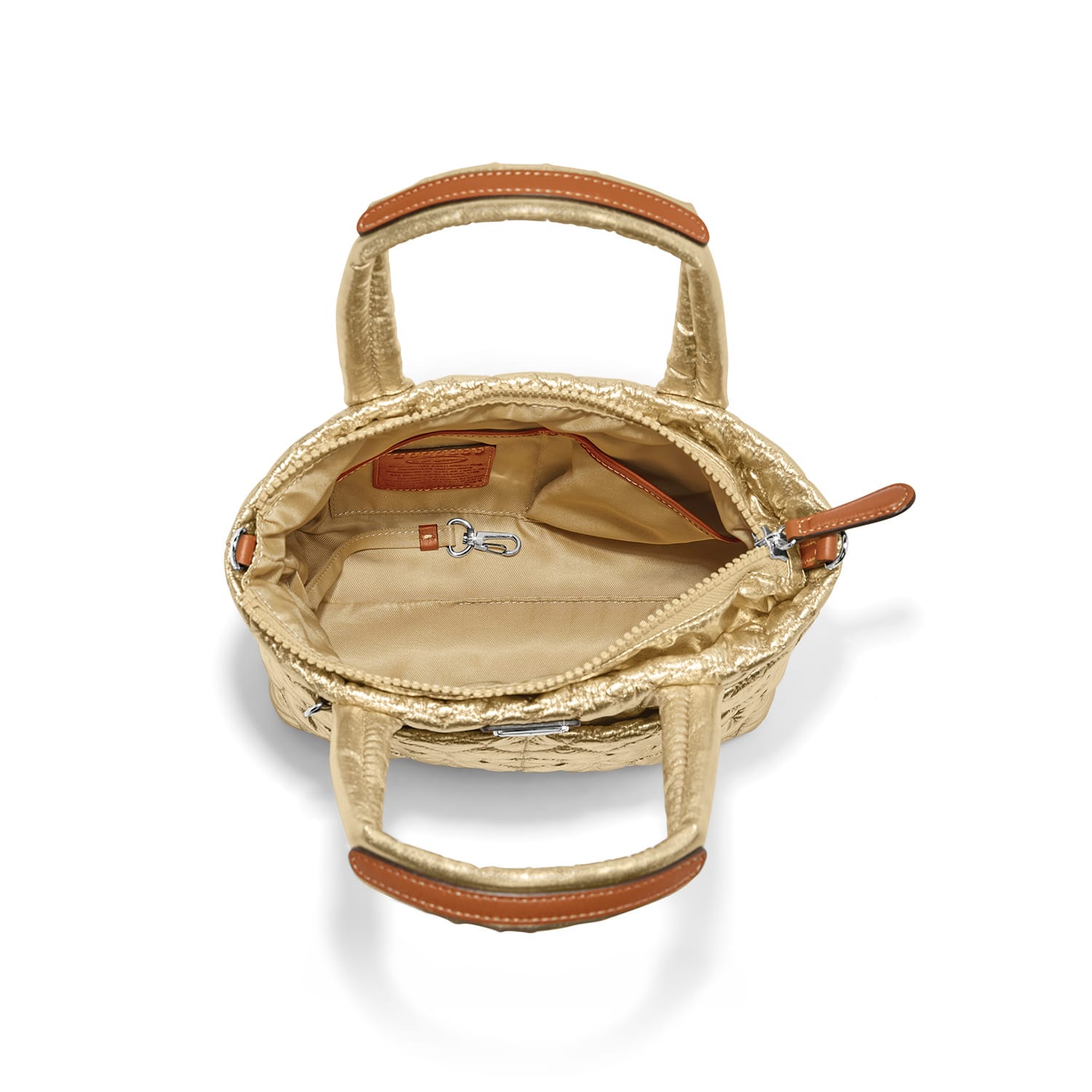 Brighton gold metallic handbag interior view with beige lining, zip closure, and tan leather handles on a white background