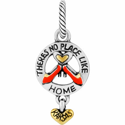 Brighton charm with two-tone There's No Place Like Home ruby slippers design and Kansas heart dangle on a white background