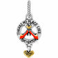 Brighton charm with red ruby slippers, gold heart, Kansas dangle, and two-tone finish on a white background