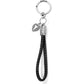 Brighton keychain with braided black leather loop, silver-plated heart charm, and engraved scroll details on a white background