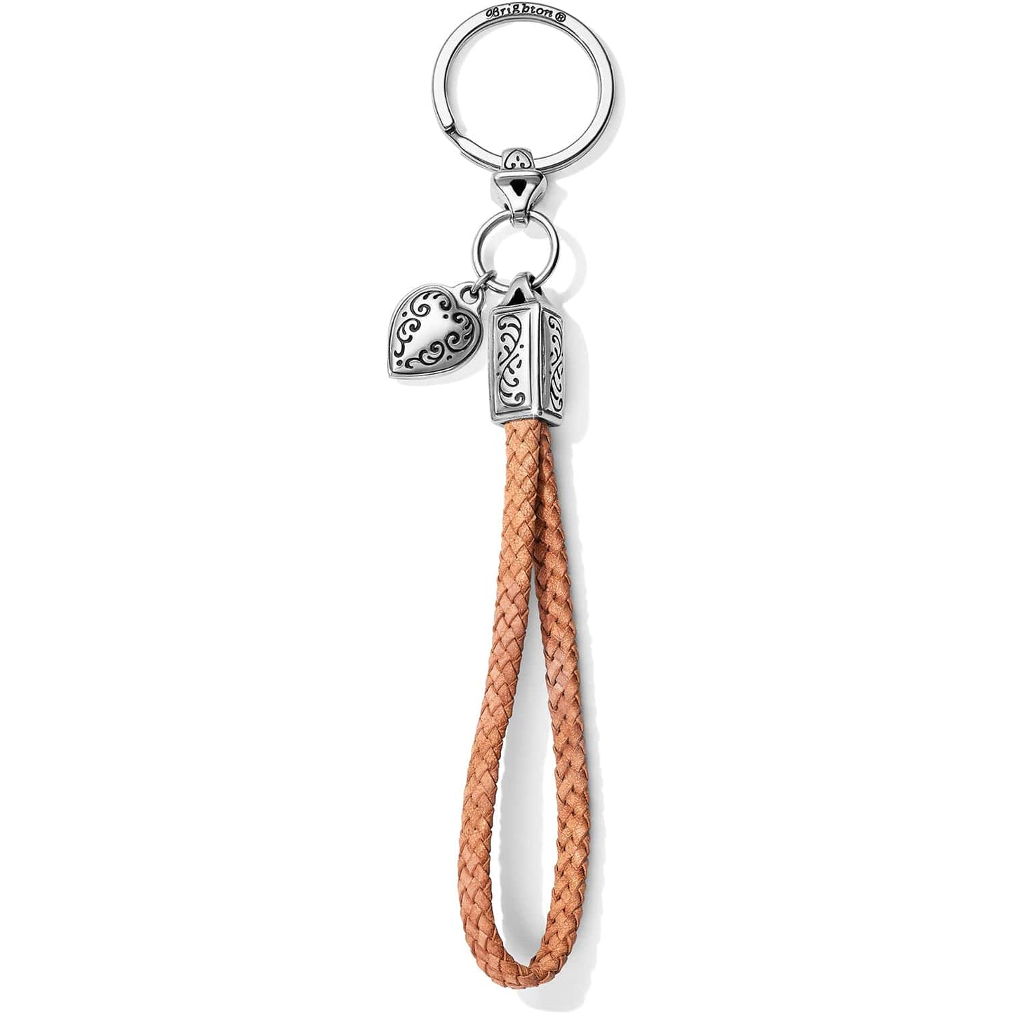 Brighton keychain with braided tan leather loop, silver-plated heart charm, and engraved scroll details on a white background