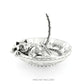 Brighton silver-plated ring holder dish with reclining cat figure and curved tail post on a white background