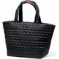 Brighton black quilted tote handbag with heart-pattern stitching and dual padded top handles on a white background