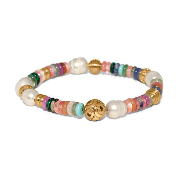 Brighton beaded bracelet with glass pearls, mixed gemstones, dyed jade, and gold-plated accent beads on a white background