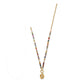 Brighton beaded pendant necklace with multicolor stones, pearls, gold-plated chain, and oval crystal pendant on a white background