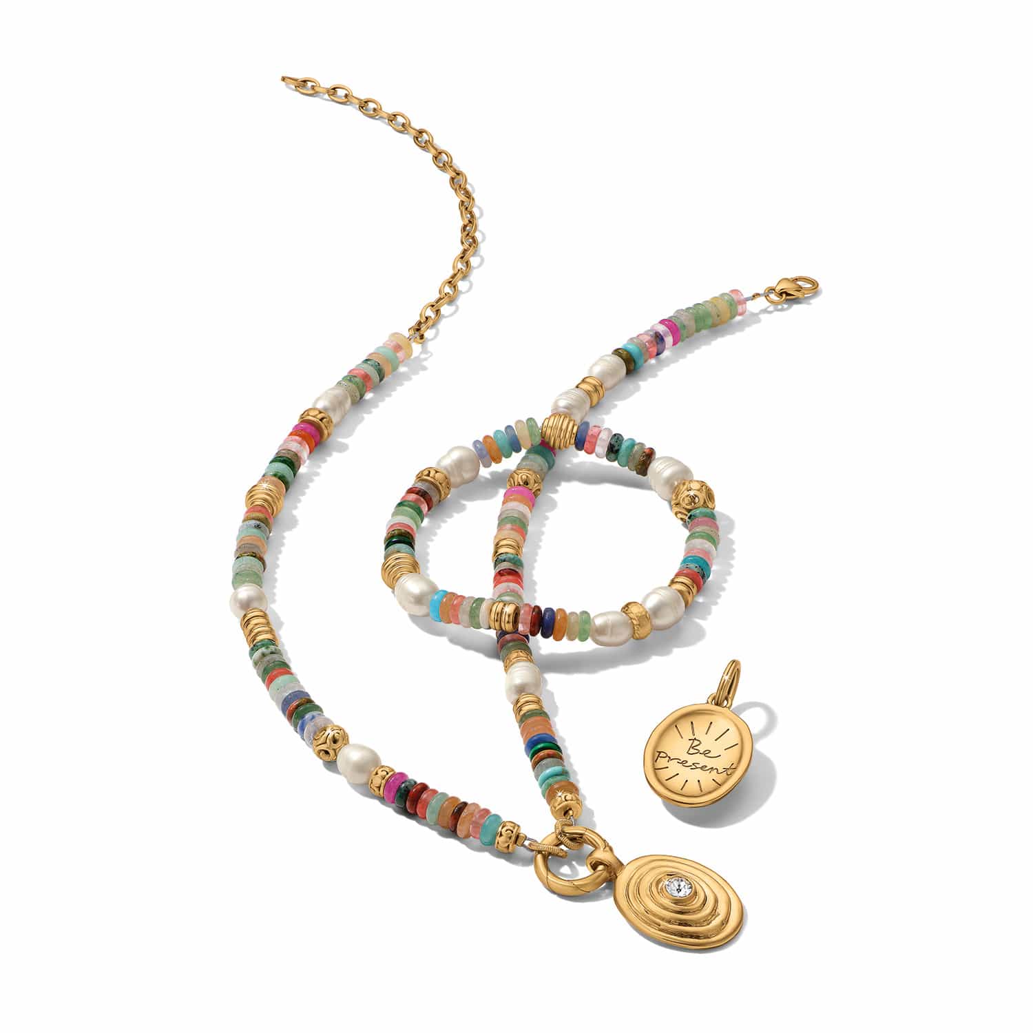 Brighton gold-plated beaded necklace and bracelet styled with a Be Present charm pendant on white background