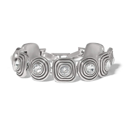 Brighton bracelet with silver-tone square links featuring concentric ridges and crystal centers on a white background