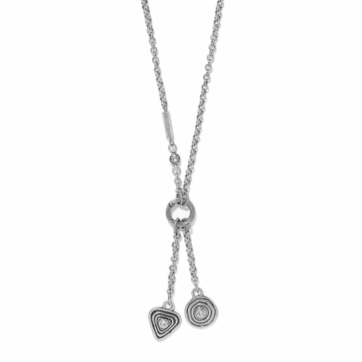 Brighton silver-plated lariat necklace with heart and circle charms featuring crystal accents on a white background