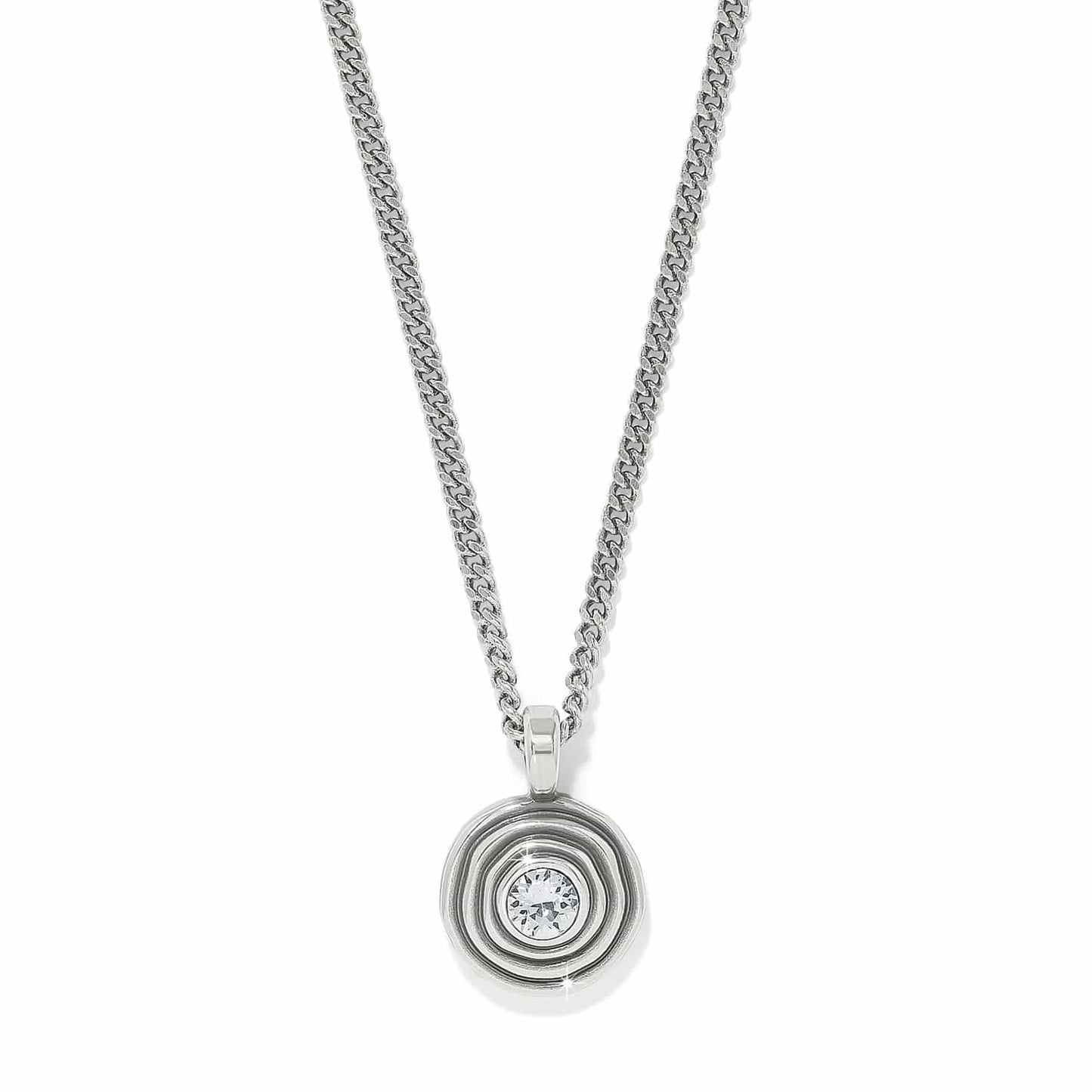 Brighton pendant necklace with silver-plated concentric circle design, central crystal, and curb chain on a white background